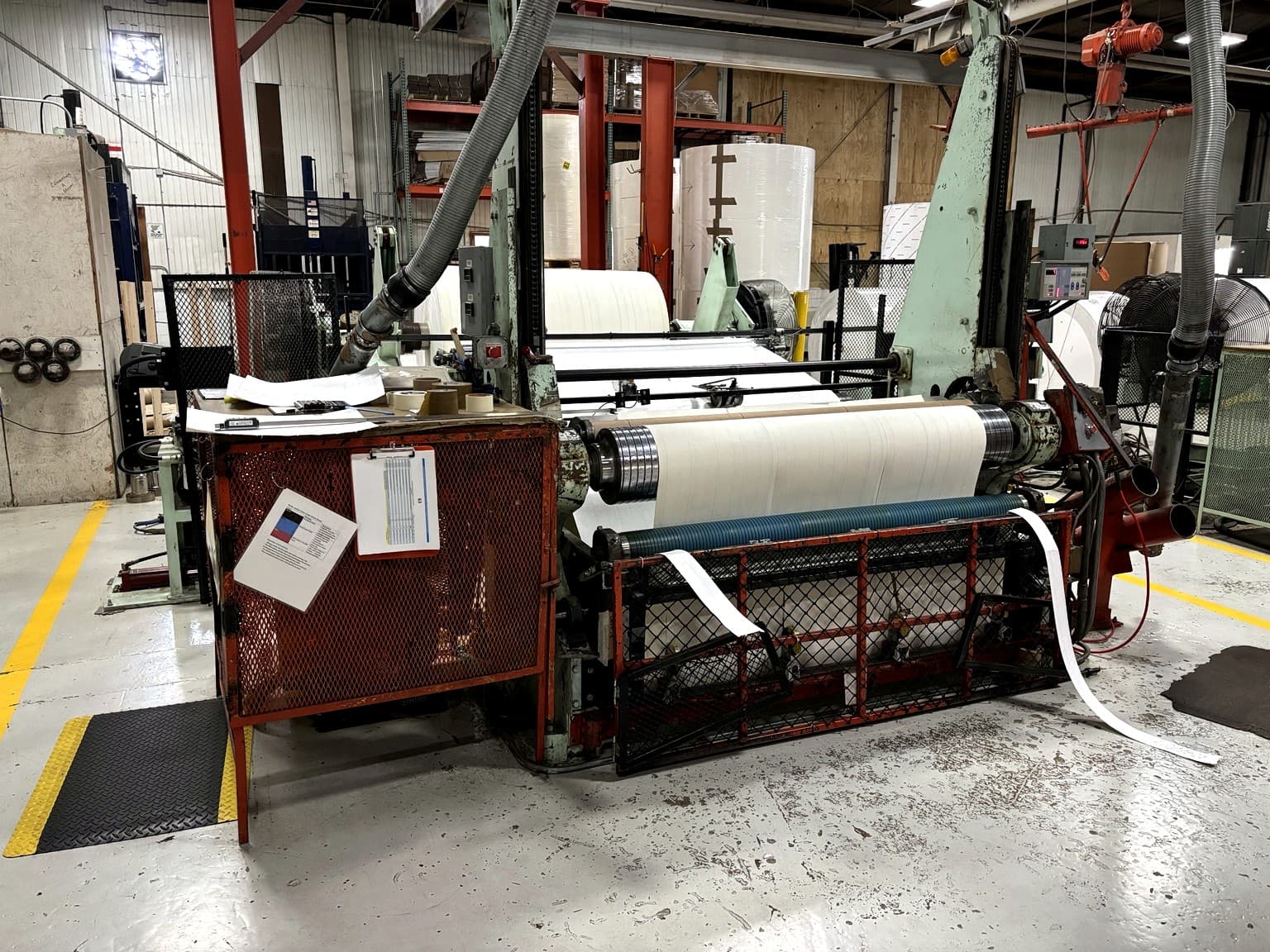 Powell slitting machine at Paper Dimensions — one of five rewinder/slitters used for precision paper slitting and rewinding in Beaver Dam, Wisconsin