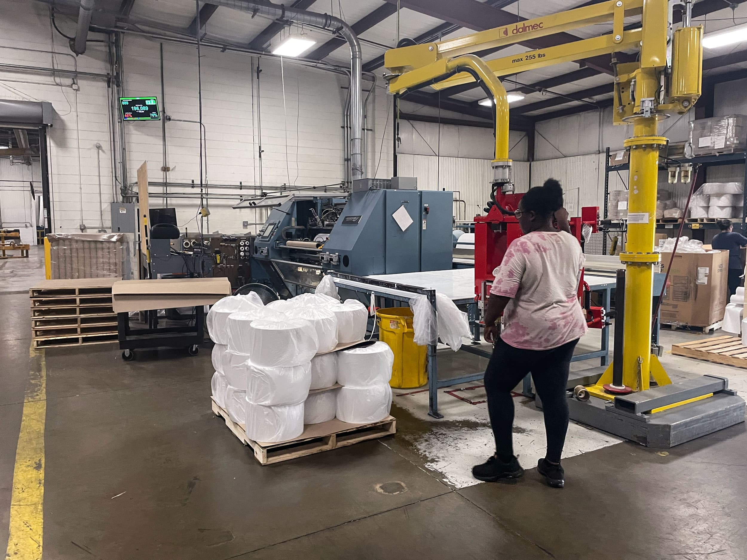 Employee working on the production floor at Paper Dimensions